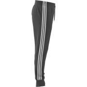 Joggingdräkter och avsmalnande slag adidas Essentials 3-Stripes